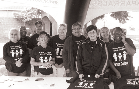 Vernon College Staff handing out t-shirts on Sports Day 2015